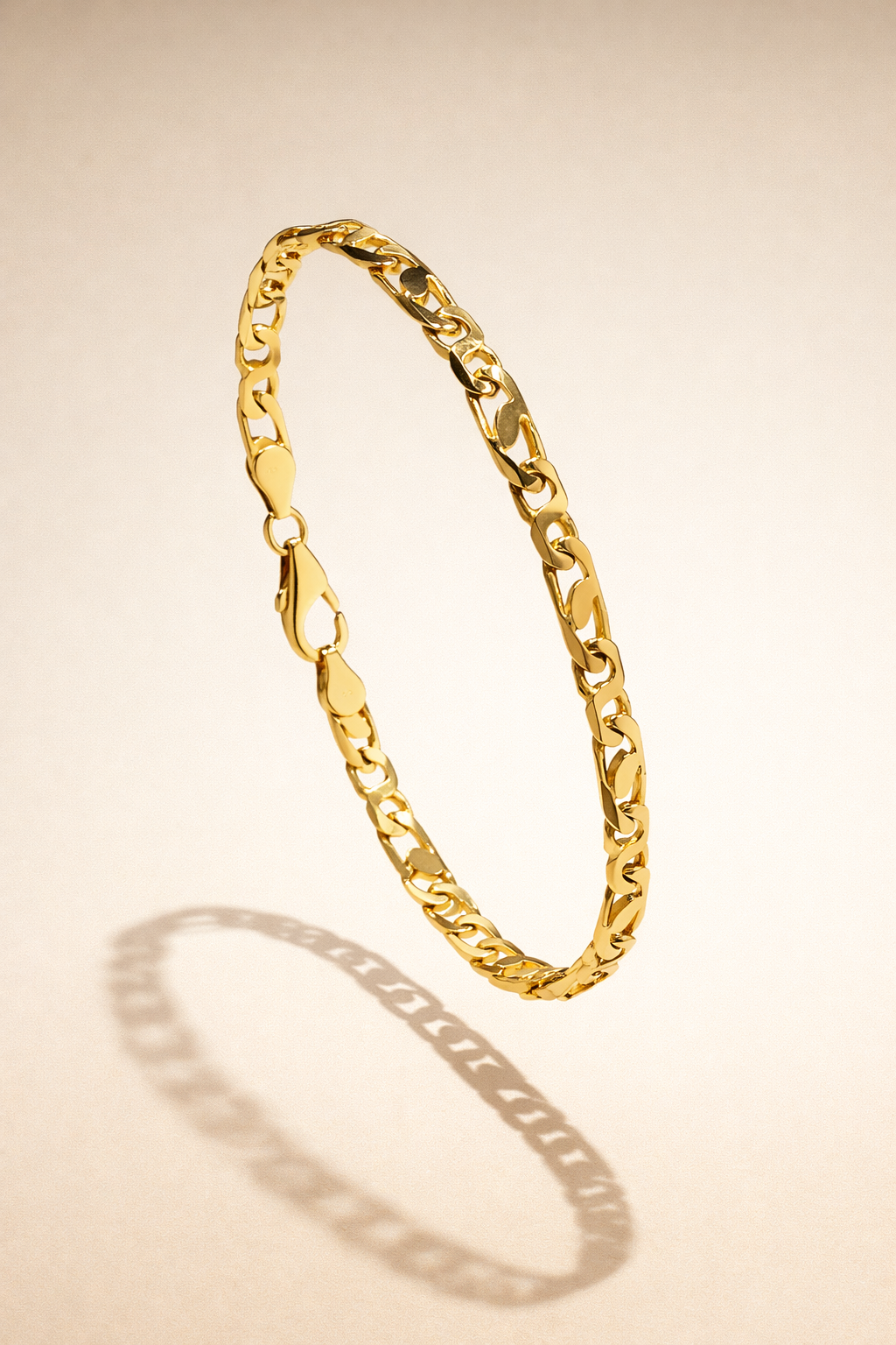 EFC0D3DA-5D58-48E5-BC56-FB57A1D0F6FC Bracciale uomo, Figaro groumette, a maglia piena in oro 18kt - immagine 1